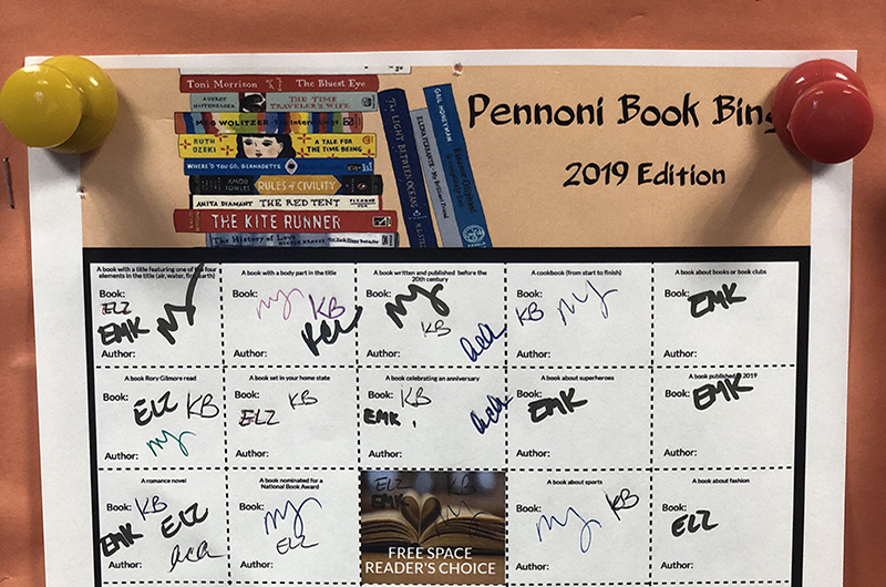The 2019 Pennoni Book Bingo Board hanging in the Pennoni Honors College. Participants sign the squares that they've completed. 